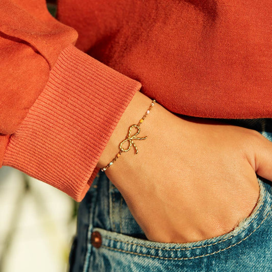 Twisted Bow Bracelet In Gold Plated