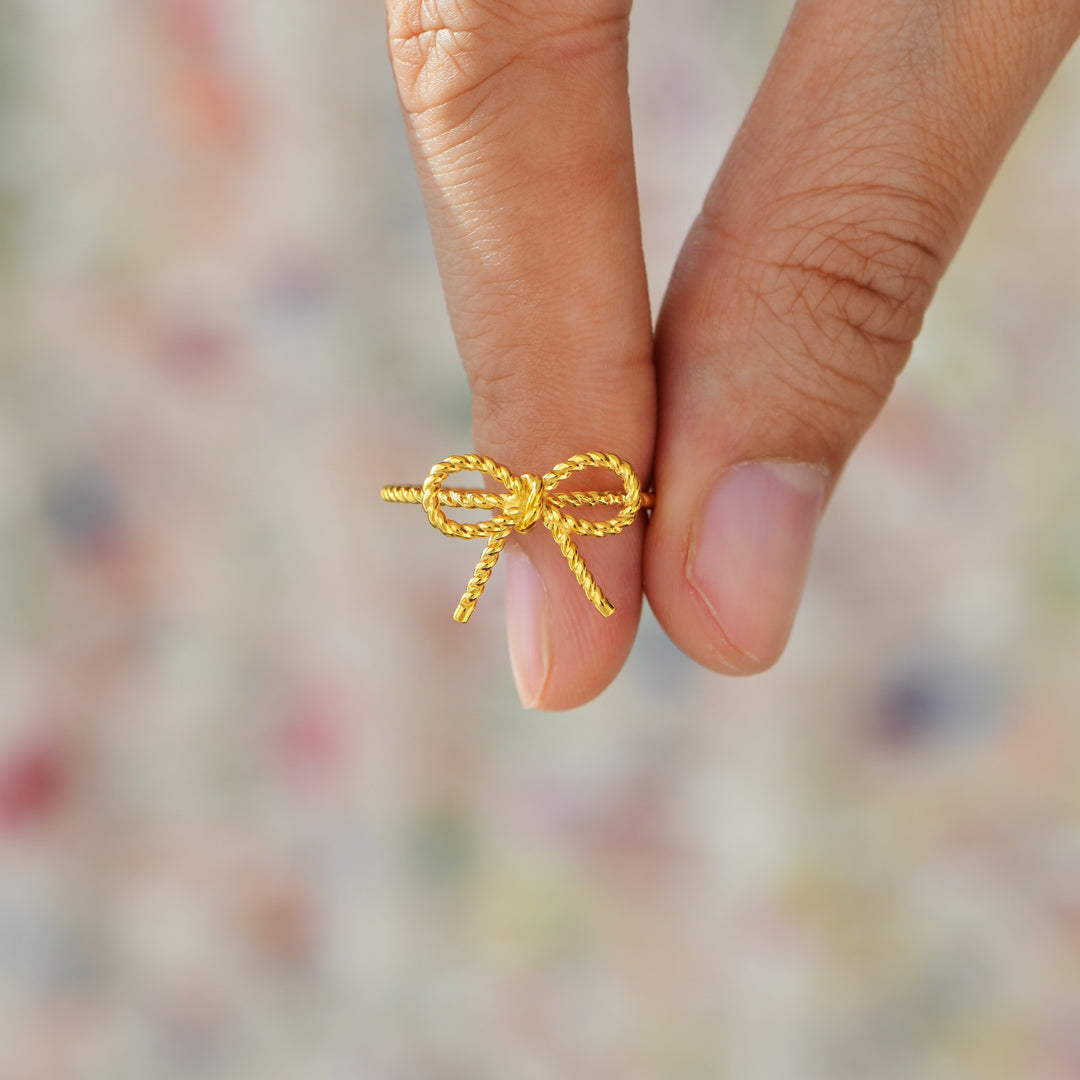 Sealed with Angel's Kiss Golden Ribbon Ring