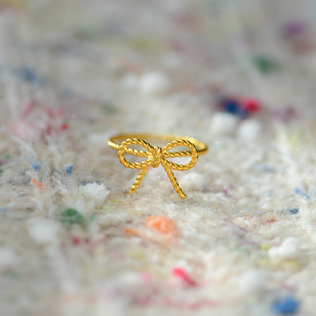 Sealed with Angel's Kiss Golden Ribbon Ring