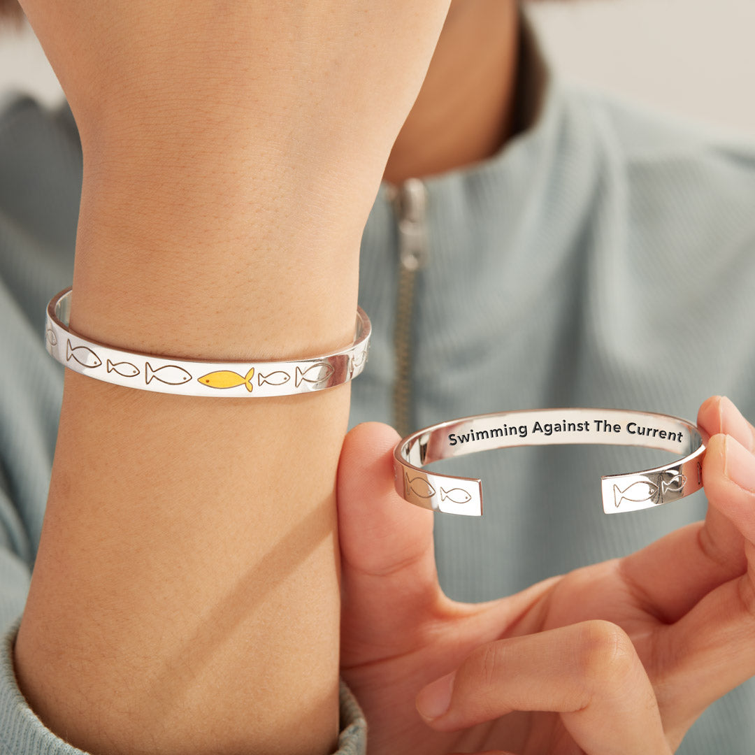 Swimming Against The Current Fish Bangle